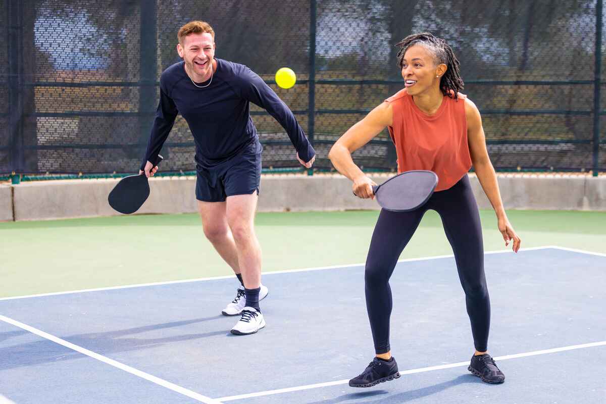 Players on a pickleball court 