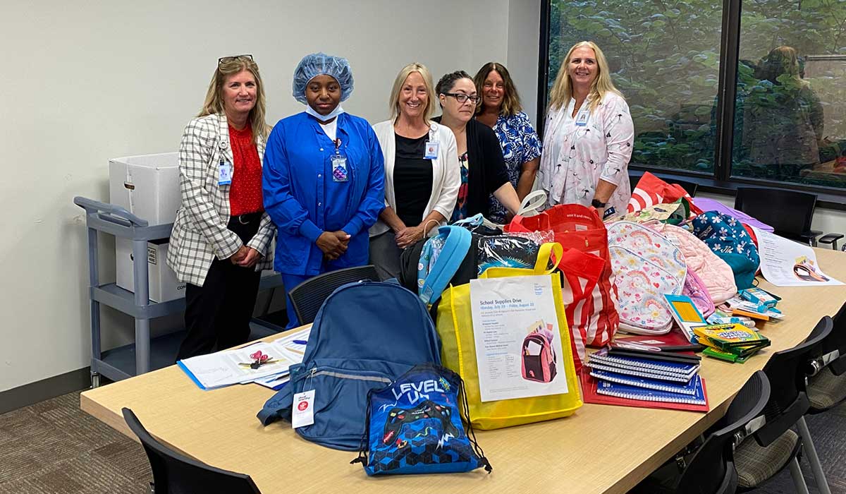 Christine Hines, director, Ambulatory Operations West; Tracey Douet, pharmacy technician; Gean Brown, clinical program manager, Breast Center; Michele Flaherty, supervisor, Ambulatory Operations West; Michele Roy, supervisor, imaging; and Kathleen Moseman, patient services manager, Ambulatory Operations West